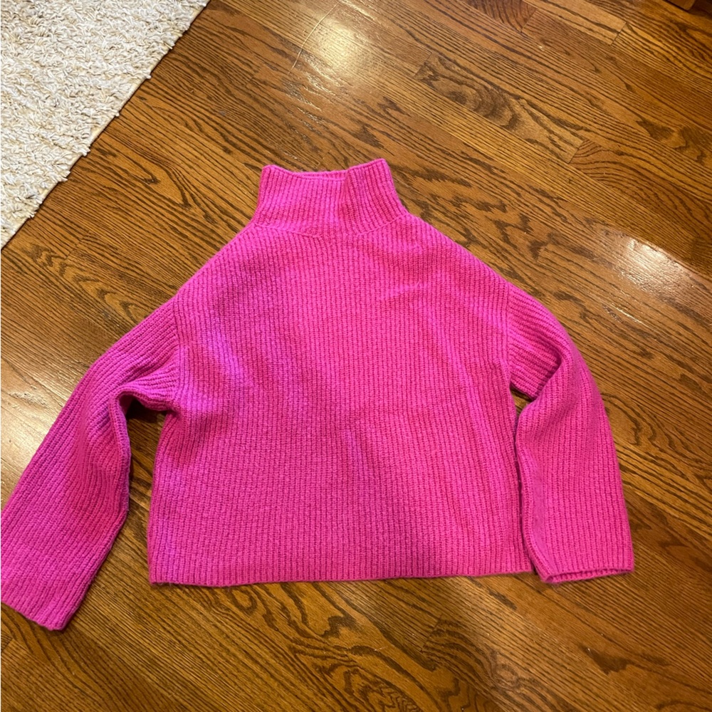 Pink mock turtleneck sweater